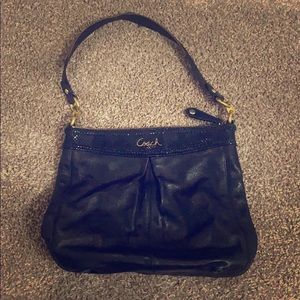 Black leather coach handbag